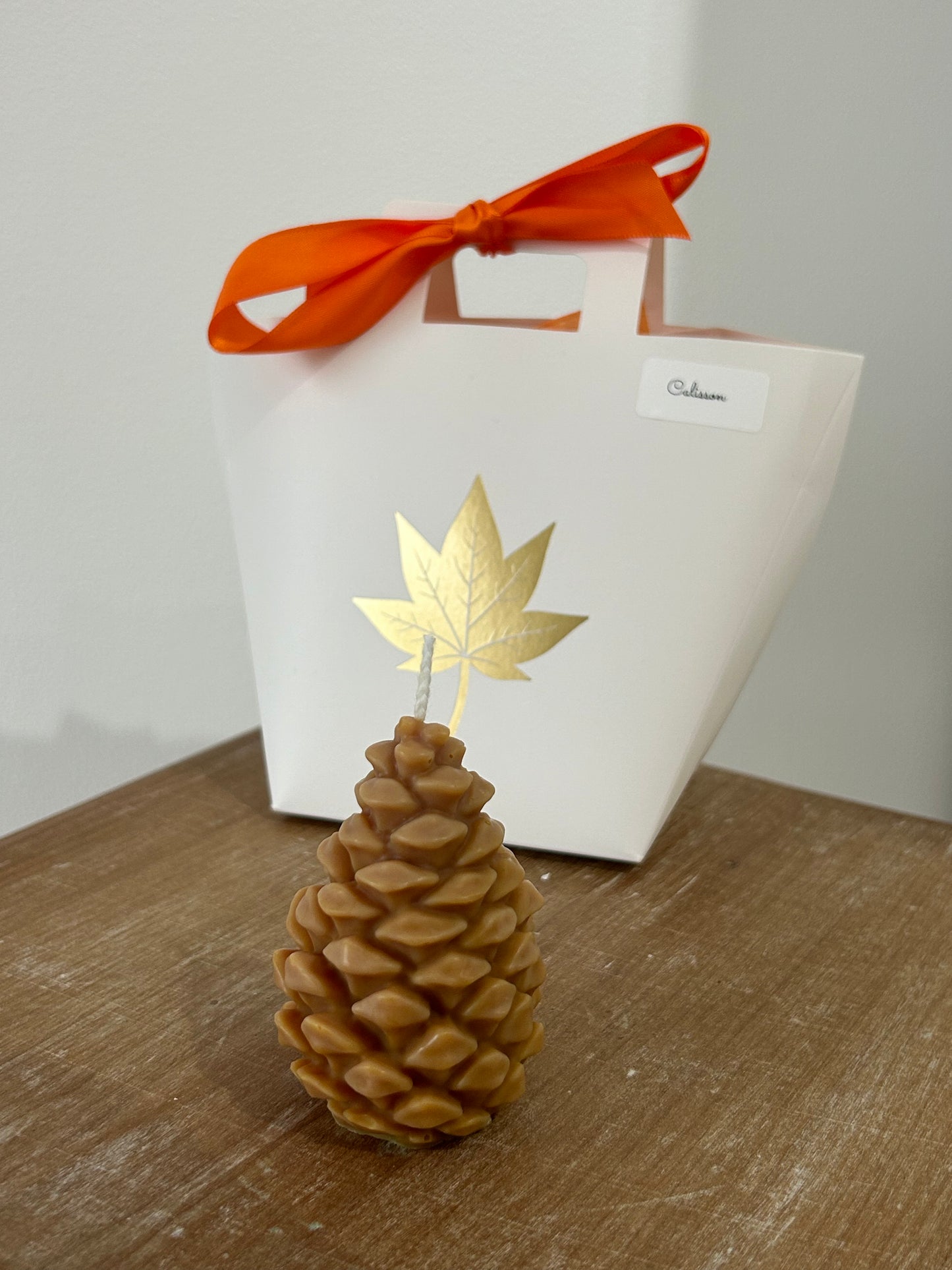 Bougie décorative Pigne de pin parfum Calisson